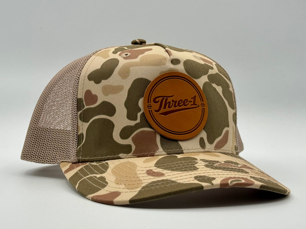 Circle Script Trucker-Duck Camo